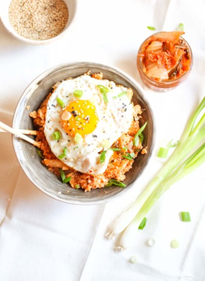 Spicy Kimchi Cauliflower Fried Rice with a Perfect Egg on Top. Grain free, gluten free, paleo, whole30, crazy delicious and done in 15 minutes! abraskitchen.com