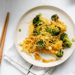 a small round plate of sesame spaghetti squash noodles