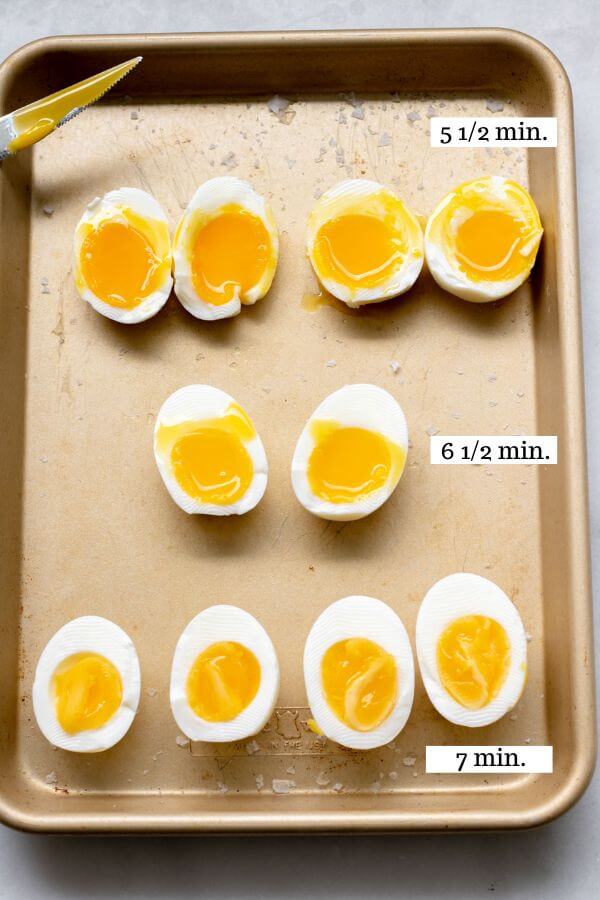 Sheet pan with jammy eggs showcasing different cook times