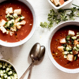 2 bowls of Healthy Charred Gazpacho on a white background