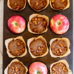 full muffin tray with apples and apple spice muffins