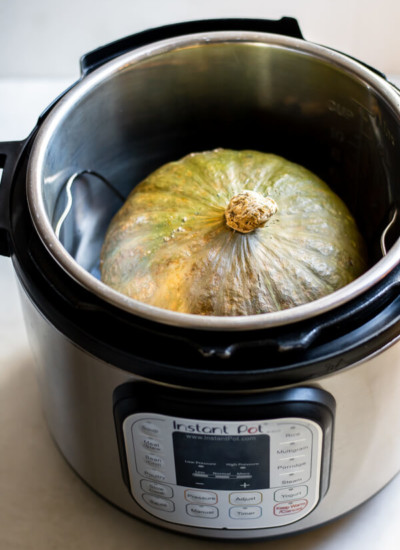 large green kabocha squash inside instant pot