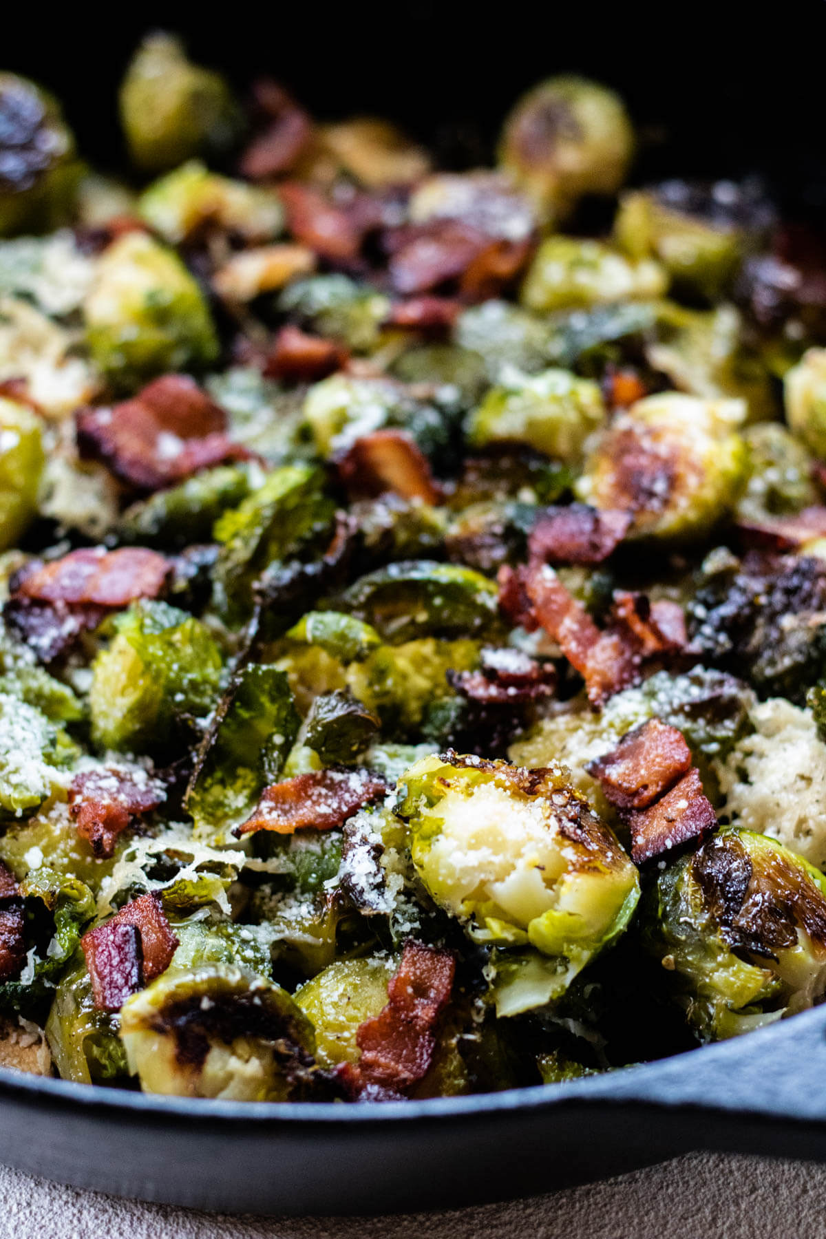 close up shot of Oven Roasted Smashed Brussels Sprouts with Bacon and Parmesan