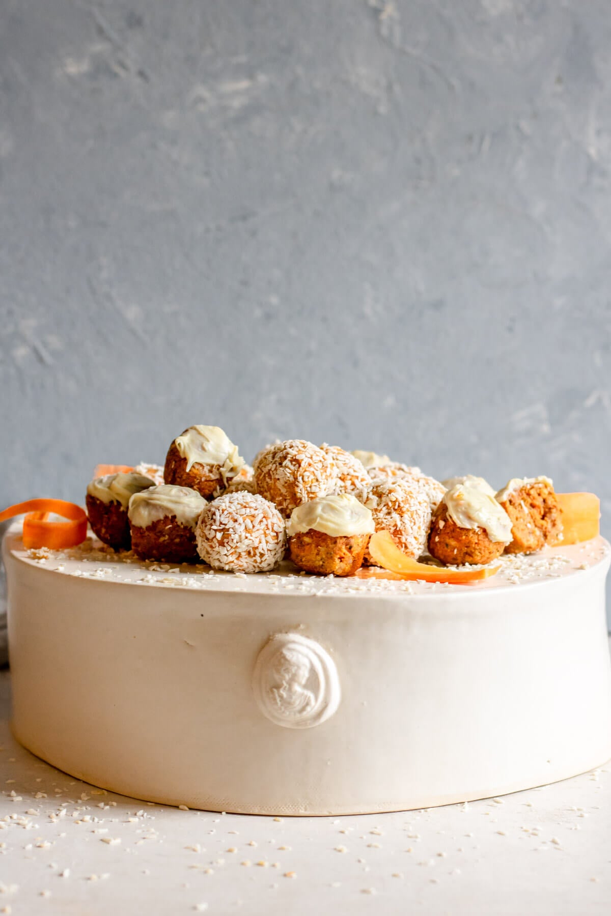 mini carrot cake bites on a white cake tray