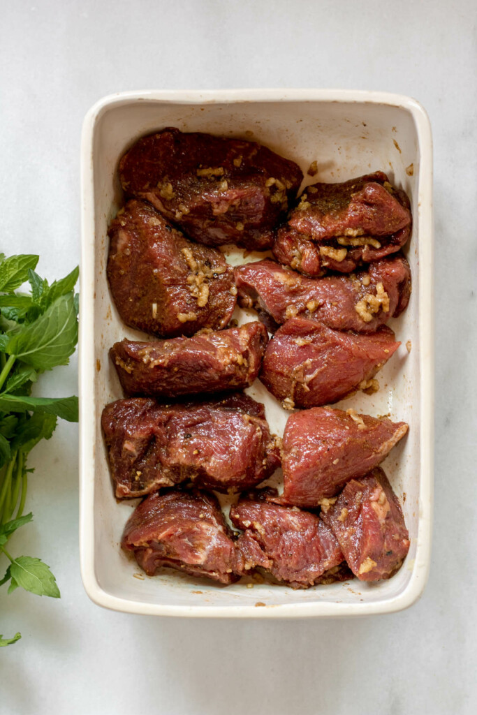 lamb marinating in spices