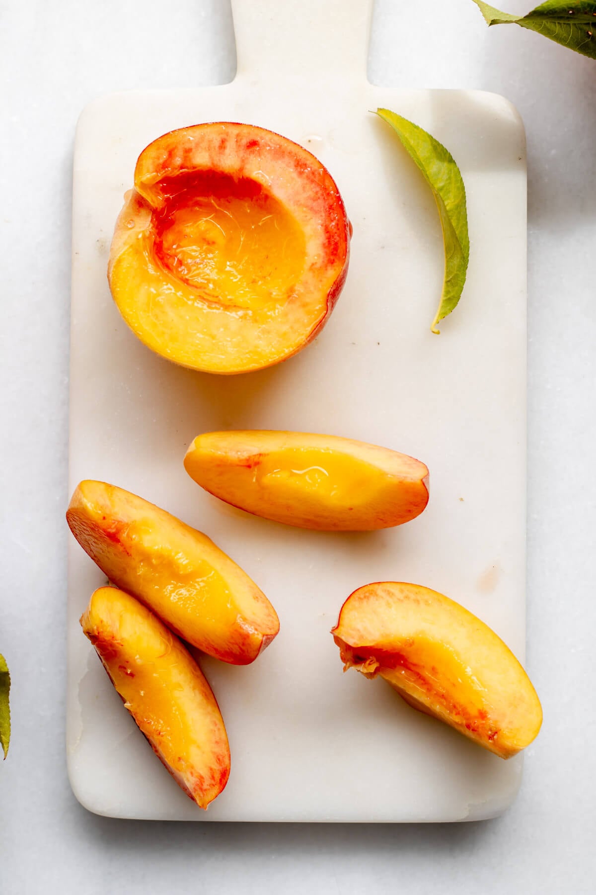 Peaches on white background