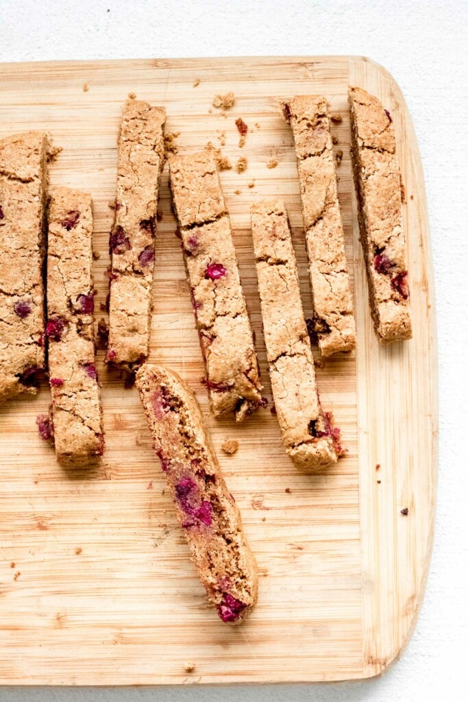 sliced biscotti on a cutting board ready for the second bake