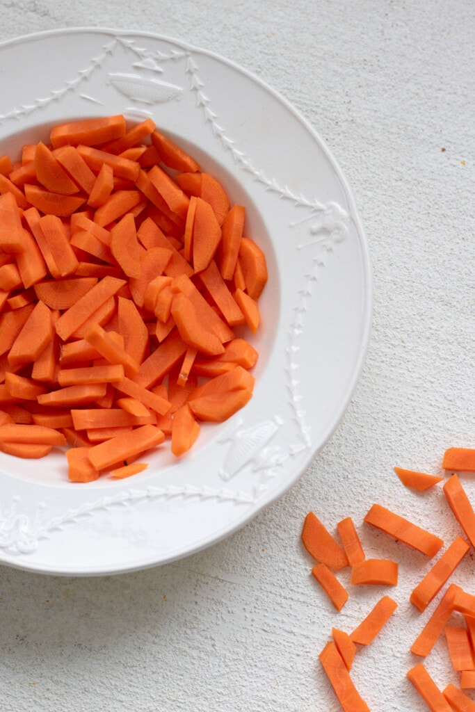 a bowl of sliced carrots