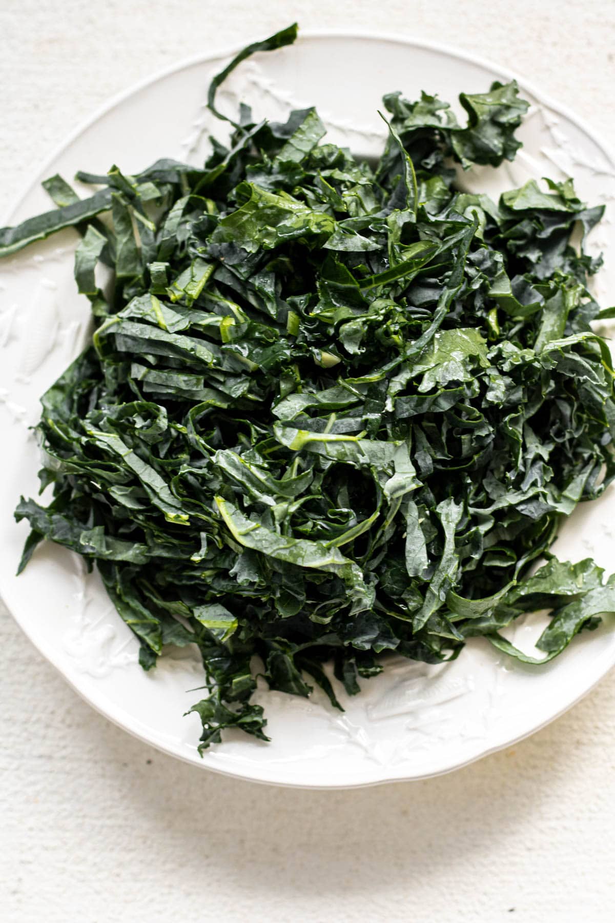 a bowl of shredded kale
