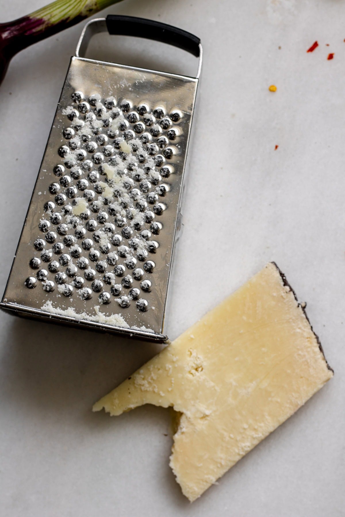 pecorino romano and a box grater