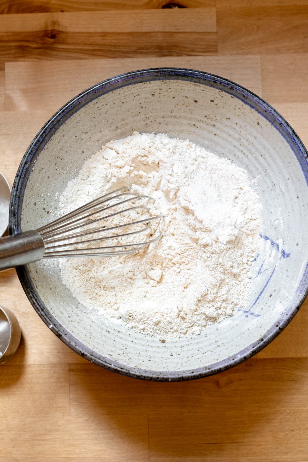 whisking together dry ingredients