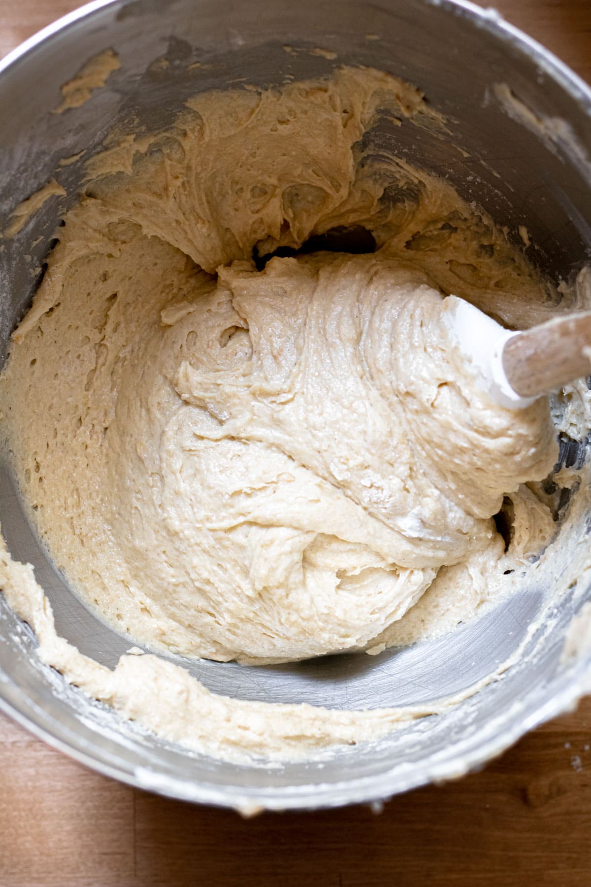 stirring the dry ingredients into the wet for gluten free pound cake