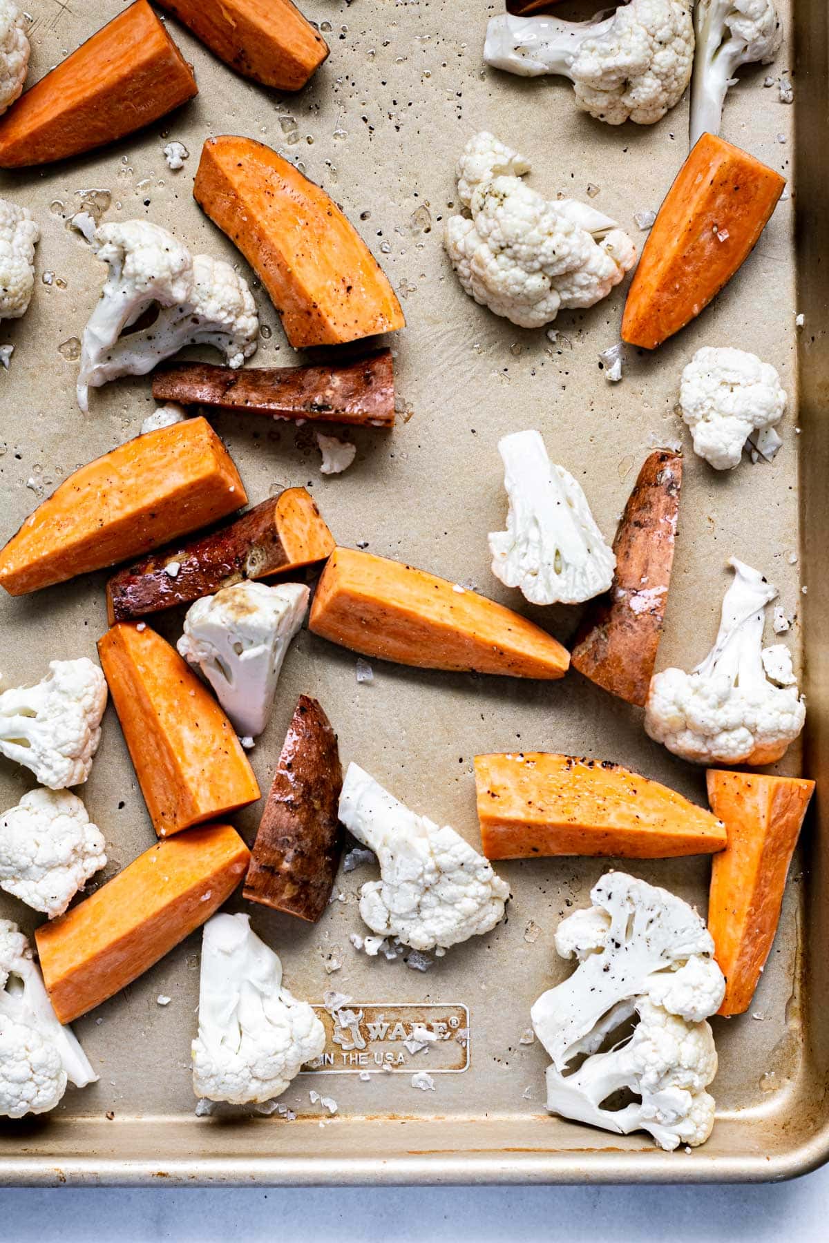 veggies on a sheet pan before roasting