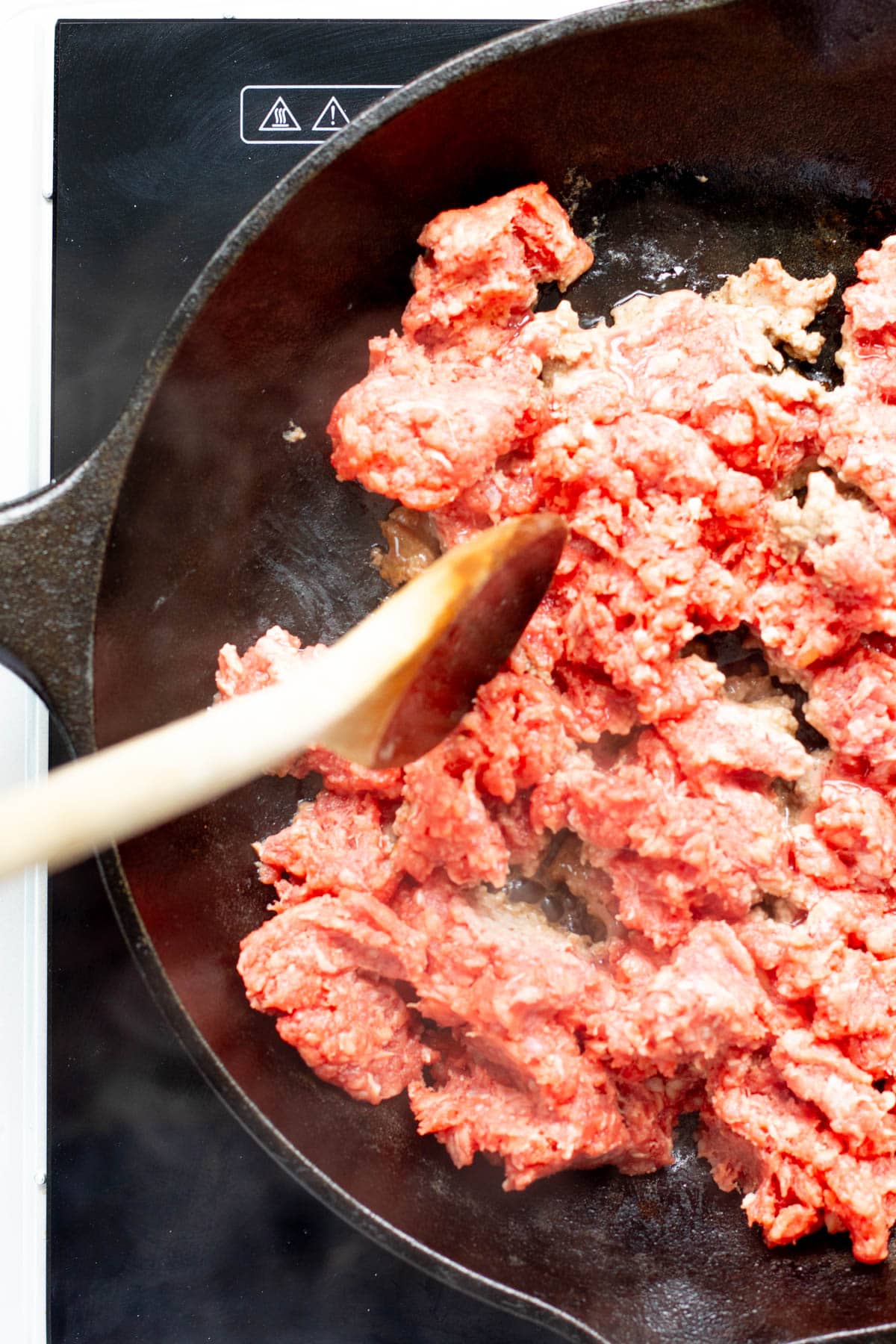 ground meat in large cast iron skillet