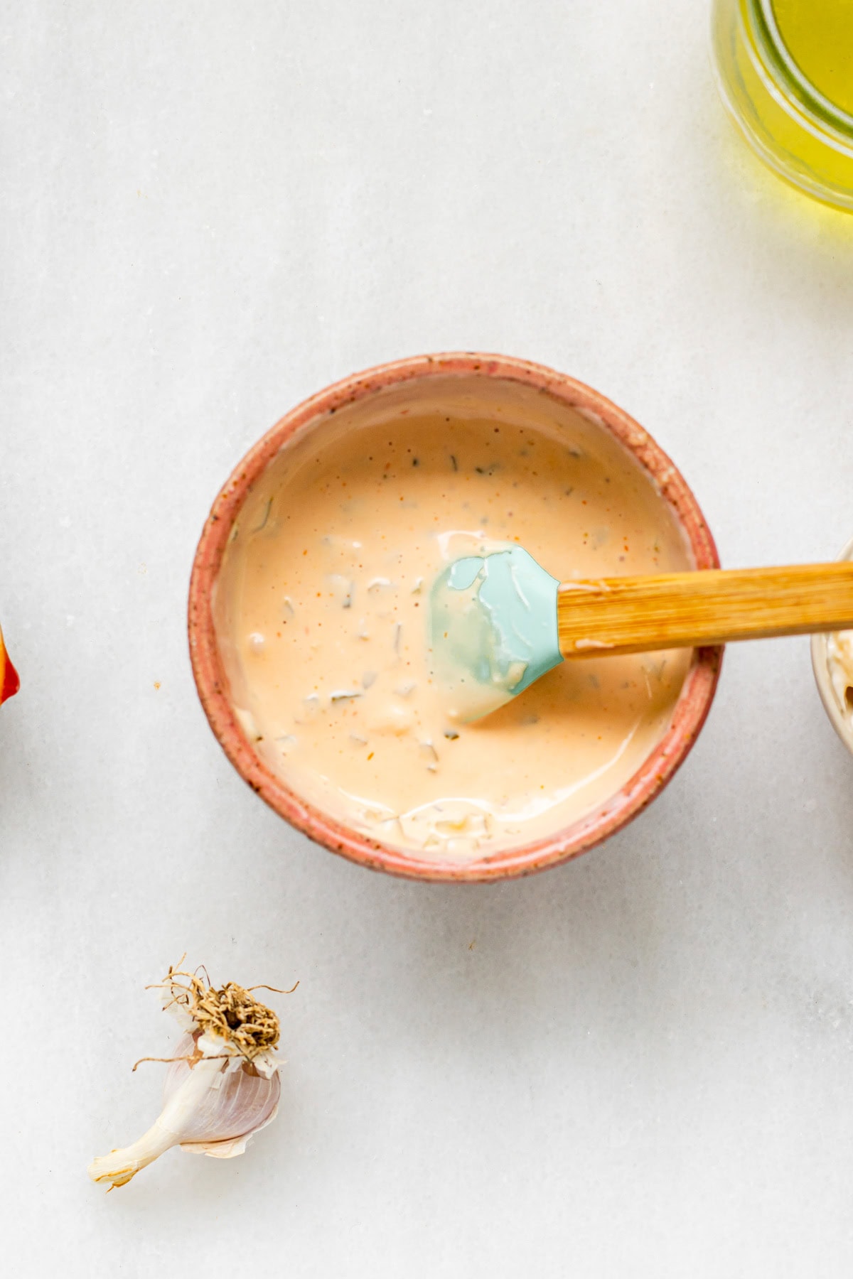 secret burger sauce in a small pink bowl on a white background