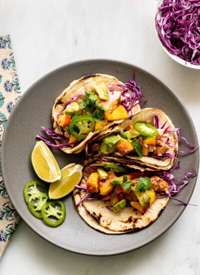 grey plate with salmon tacos