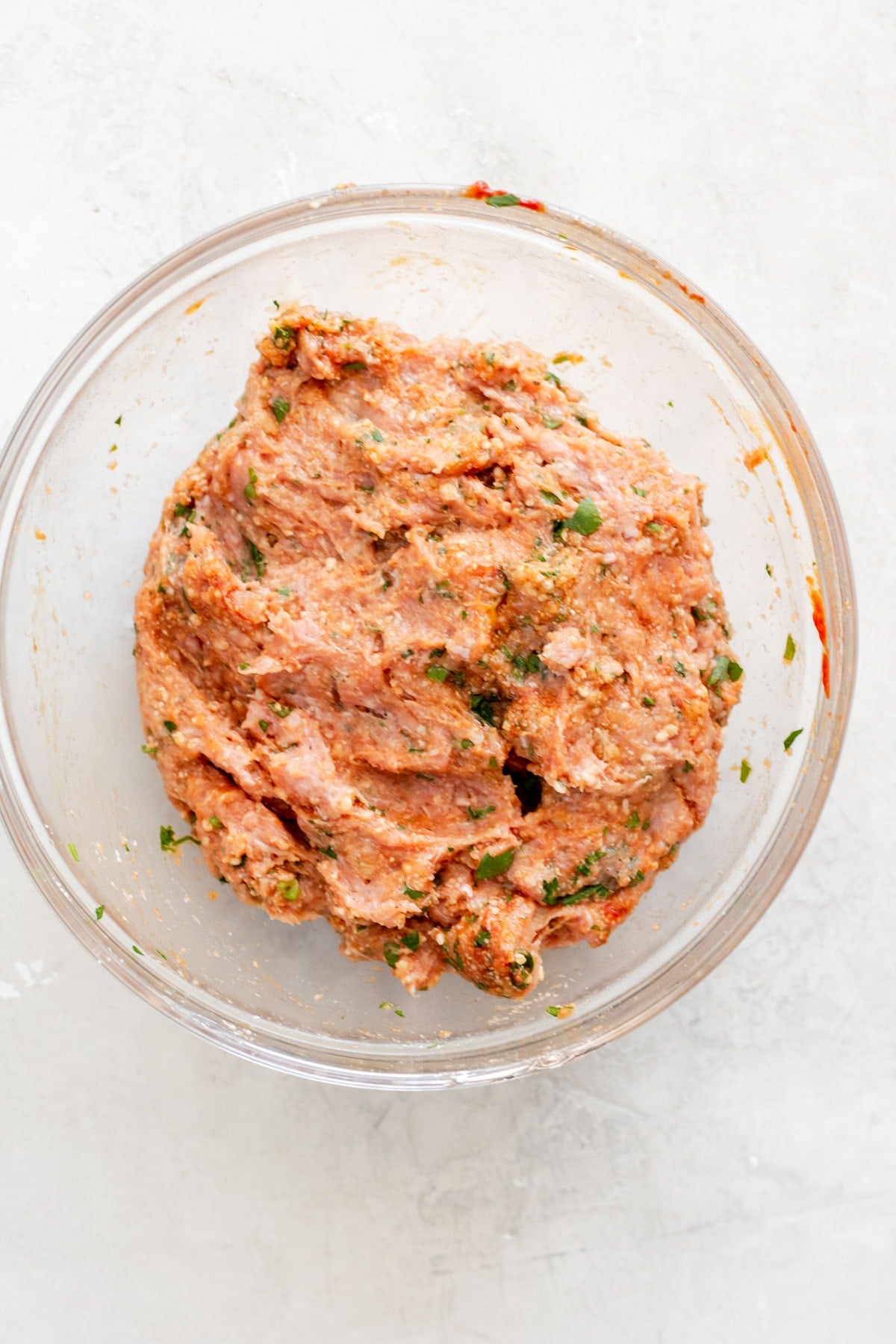 bowl of ground turkey mixture for air fryer turkey meatballs