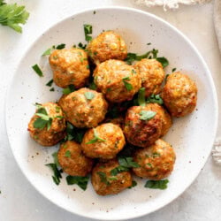 plate of air fryer turkey meatballs with fresh parsley on top