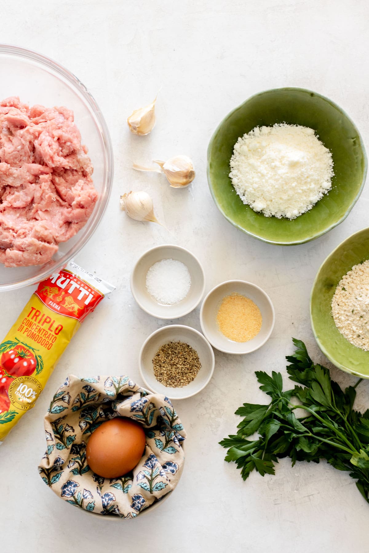 Ingredients in small bowls for air fryer turkey. meatballs