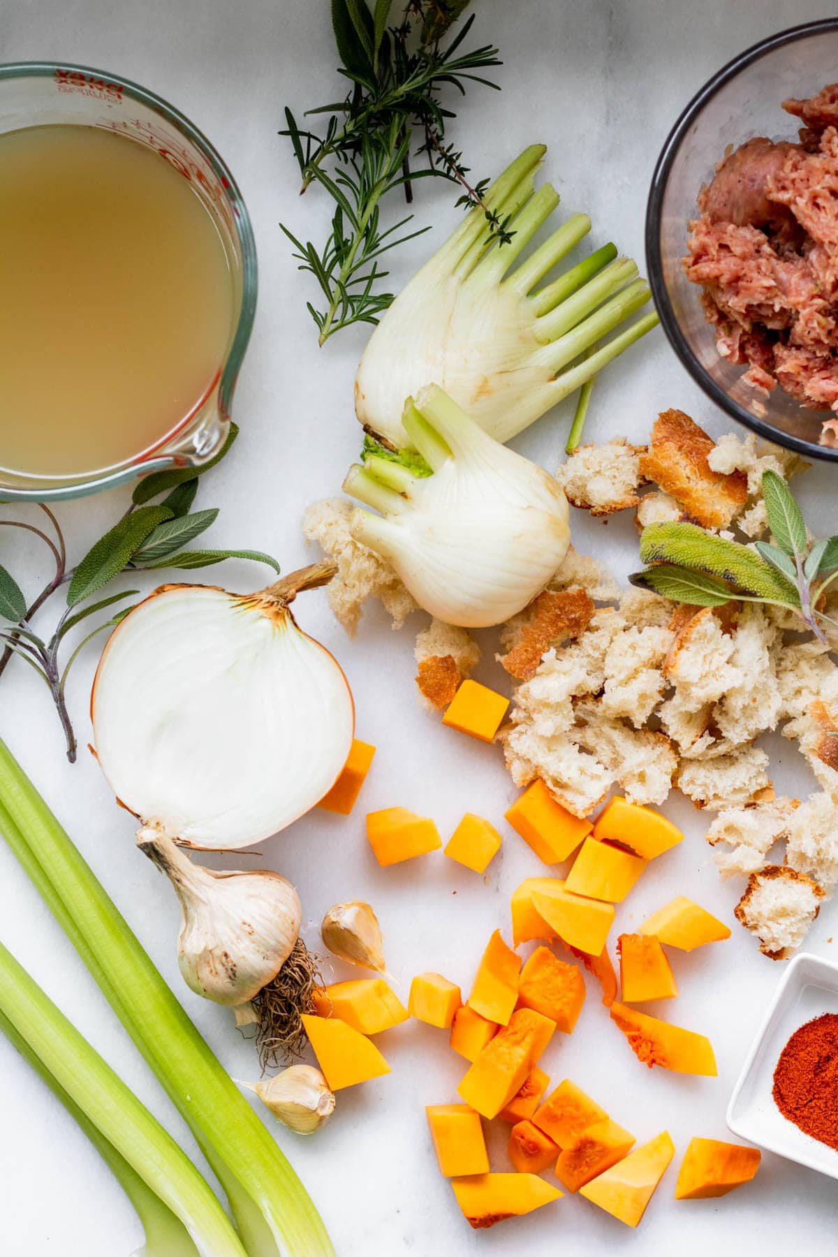 ingredients on a white background needed for butternut squash stuffing