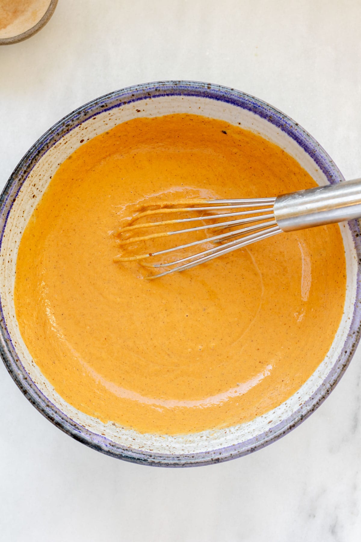 pumpkin custard whisked in a bowl