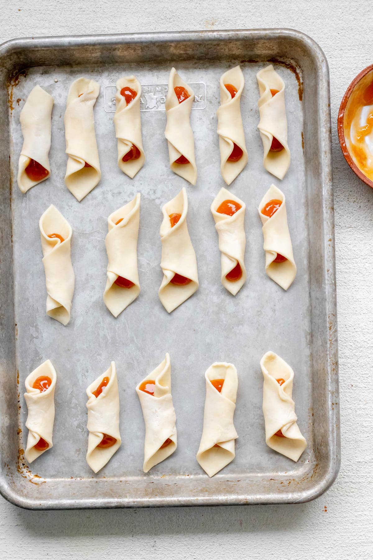 a sheet pan of Hungarian Kiffles ready to be baked