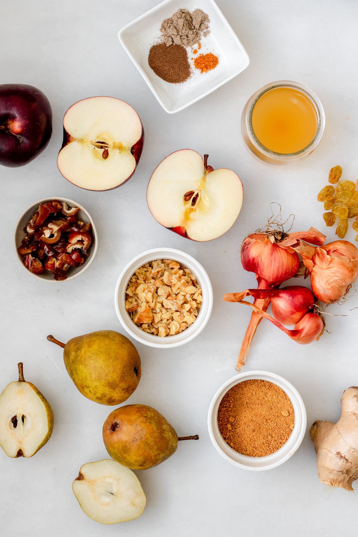 raw ingredients on a white background for apple chutney
