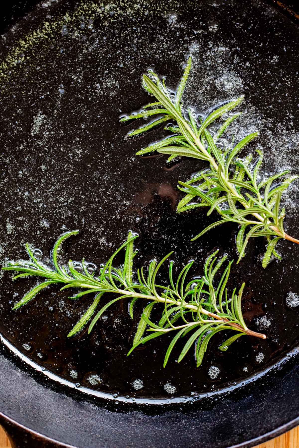 rosemary oil in a skillet