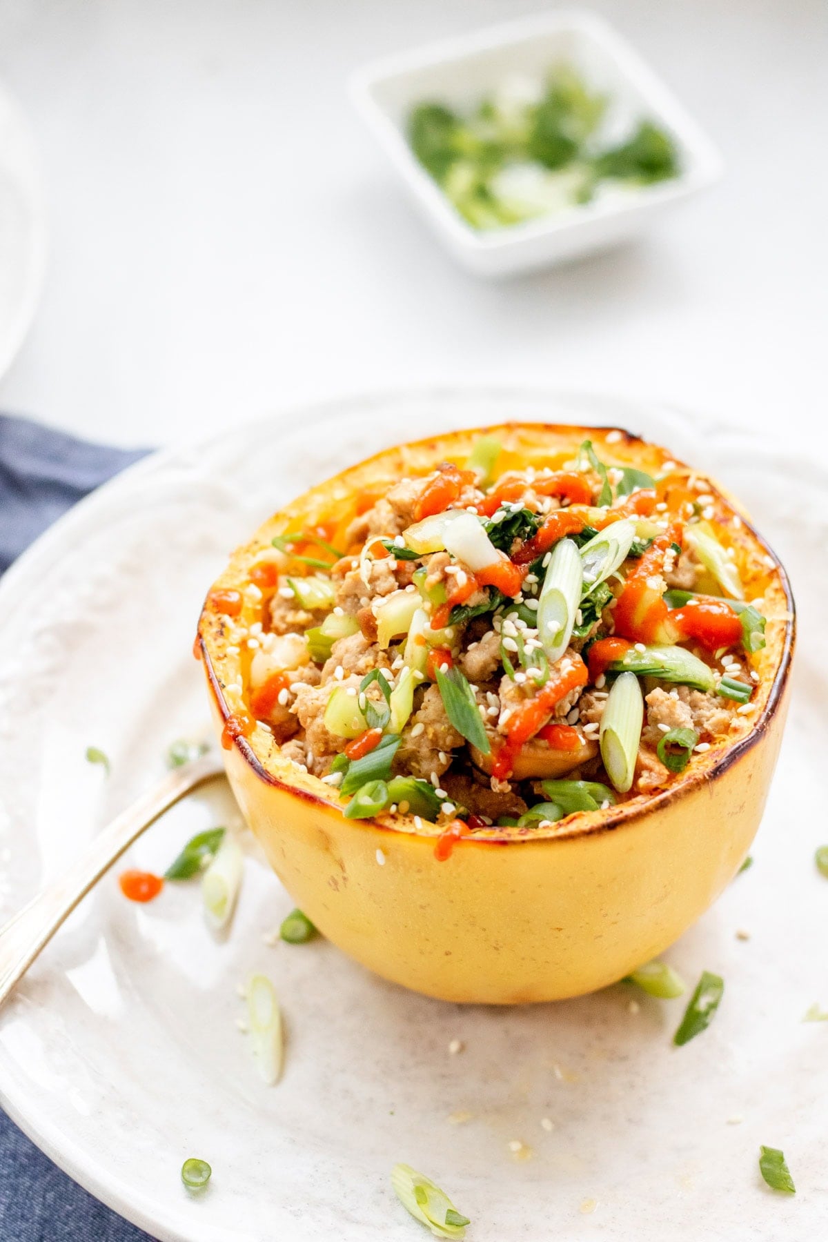 ground turkey stir fry inside a spaghetti squash boat
