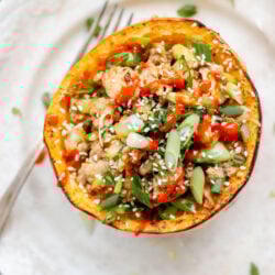 ground turkey stir fry inside a spaghetti squash boat