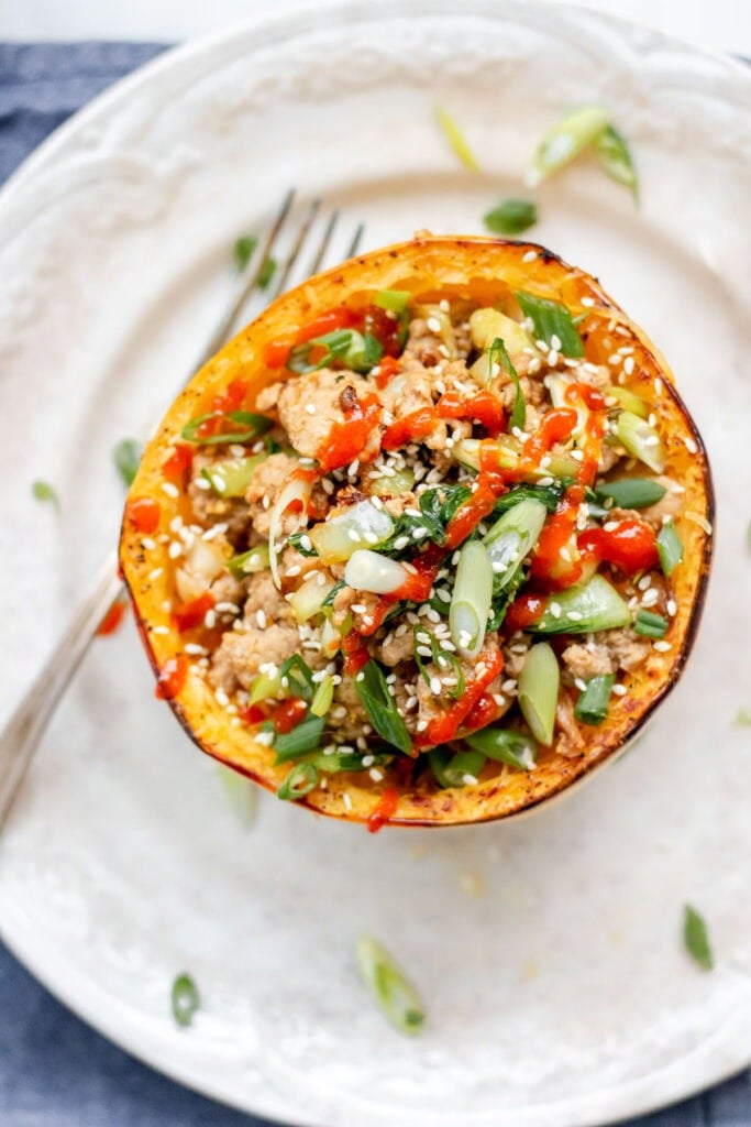 ground turkey stir fry inside a spaghetti squash boat