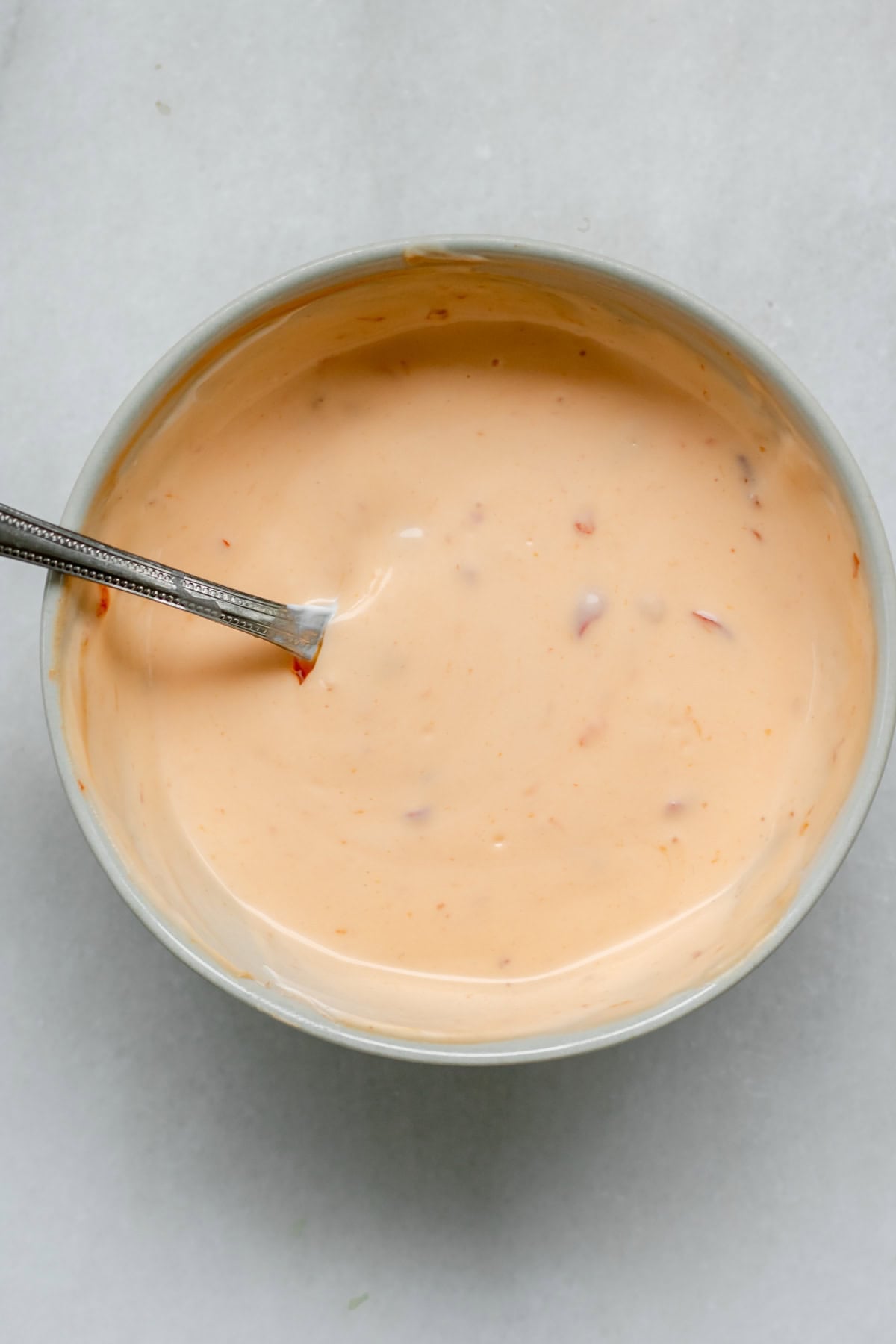 ingredients for bang bang sauce mixed in a bowl