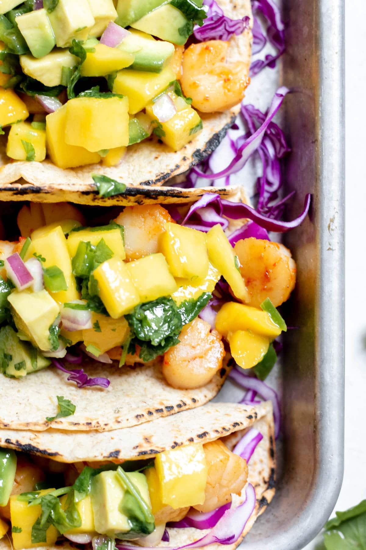 close up of Seared Scallop Tacos with Mango Avocado Salsa