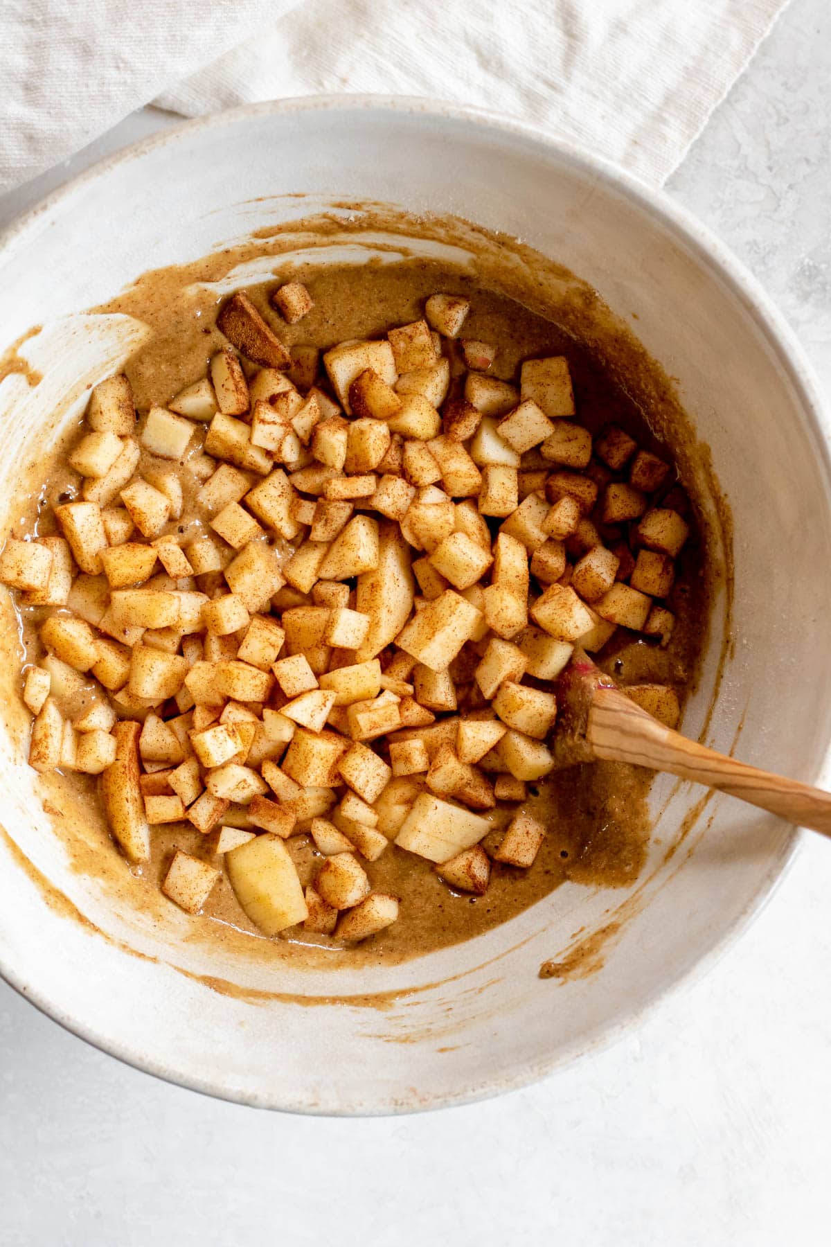 chopped apple added to muffin dough