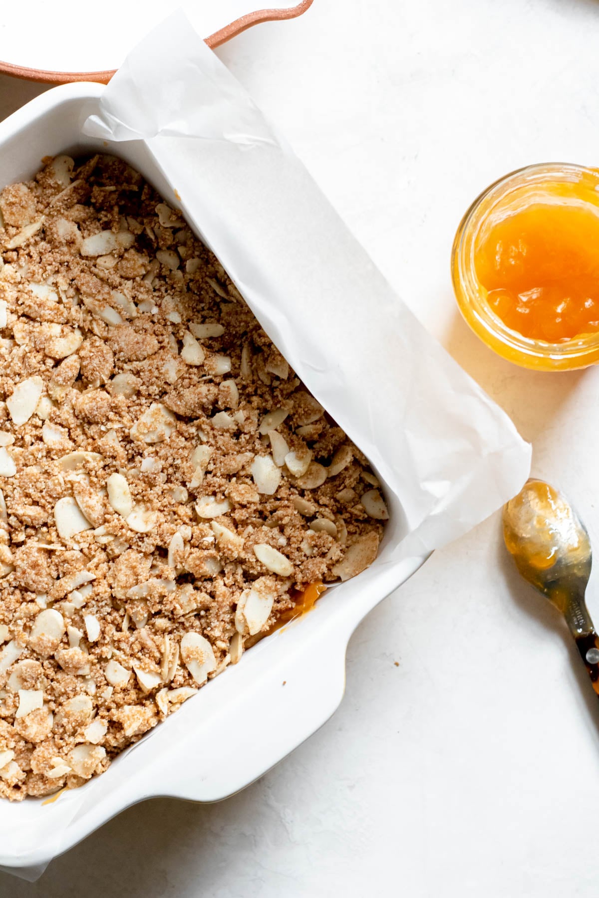 Grain Free Apricot Almond Coffee Cake in a white baking dish