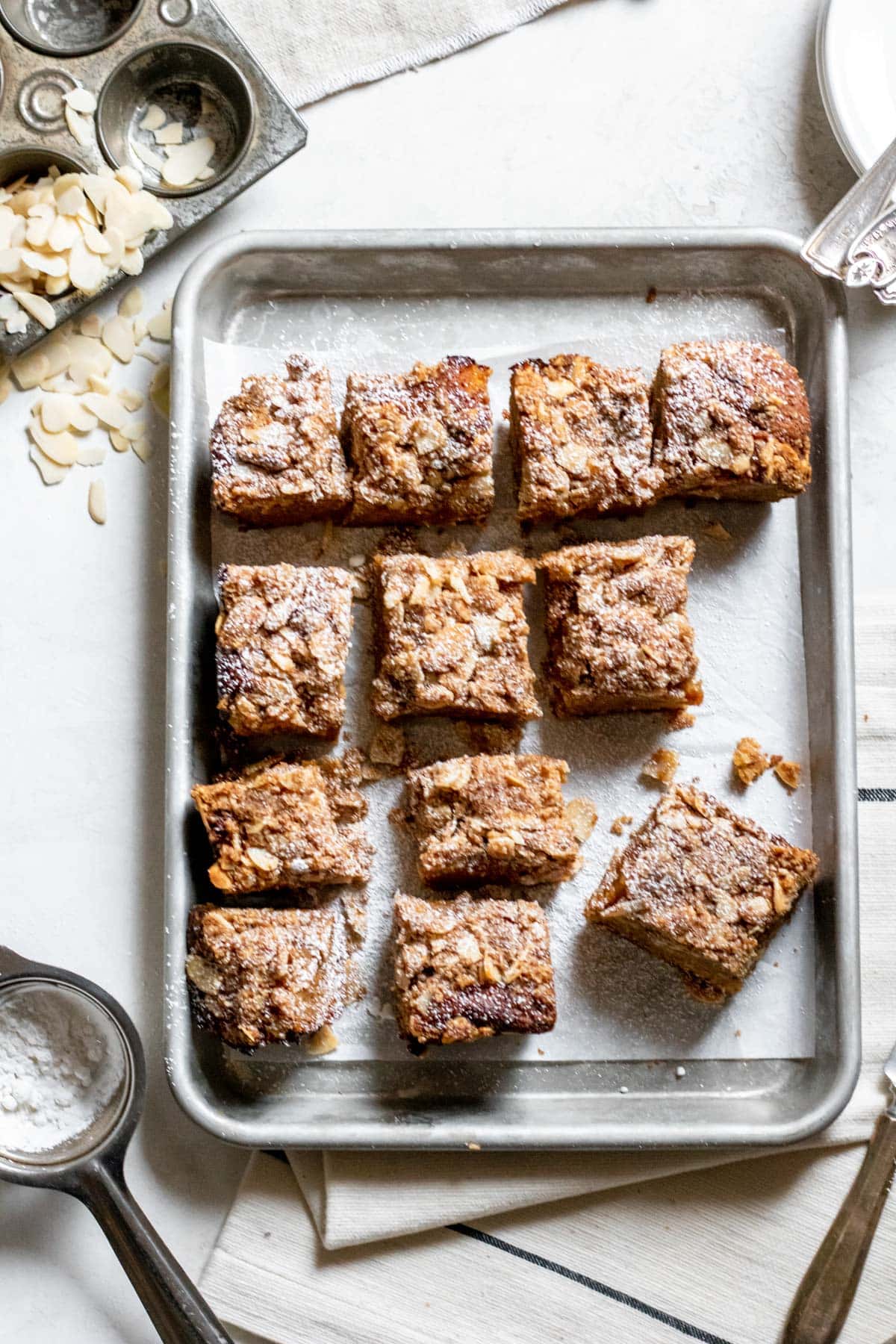 Apricot Almond Coffee Cake slices in a silver sheet pan