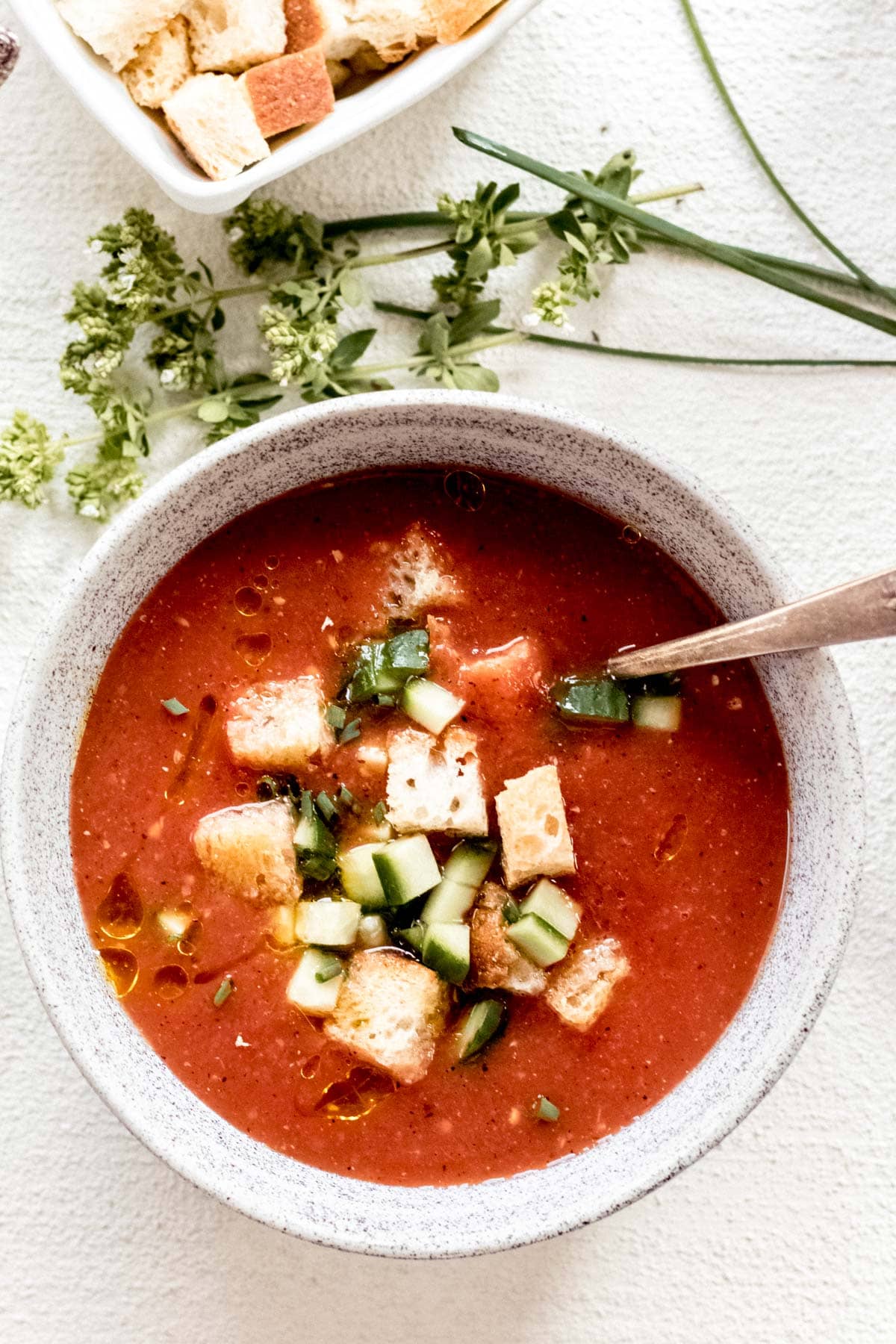 Charred Tomato Gazpacho in a bowl with croutons