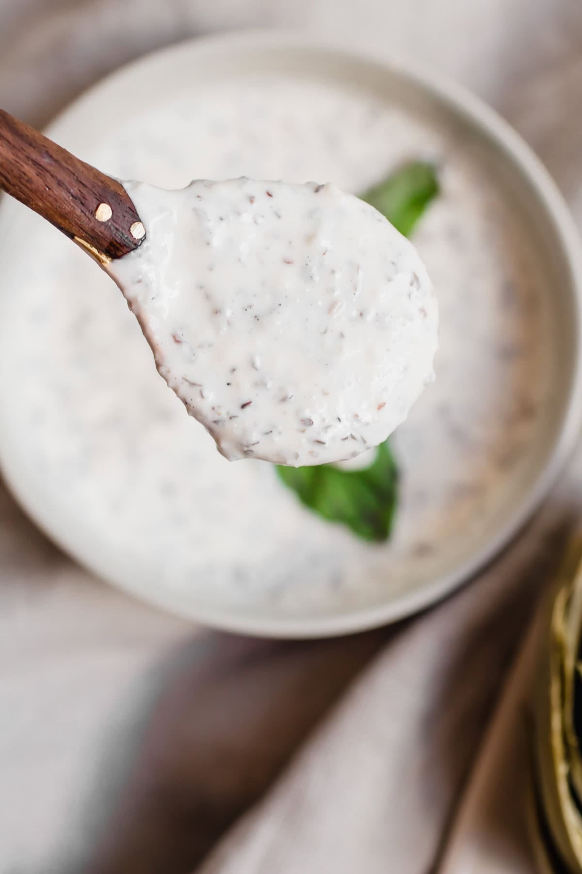 Creamy Basil Parmesan Dip in a spoon