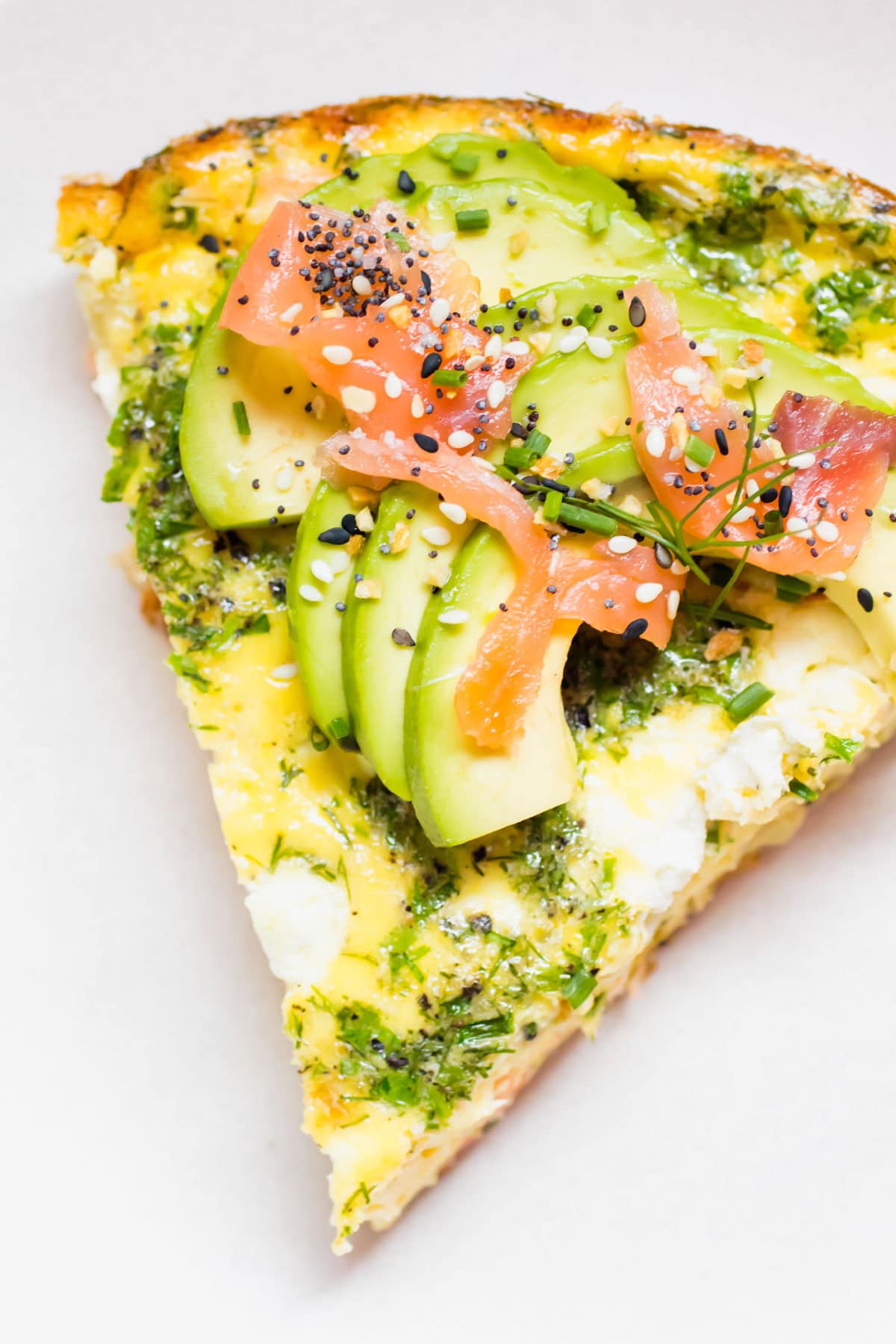 top down view of a slice of Smoked Salmon and Herb Frittata