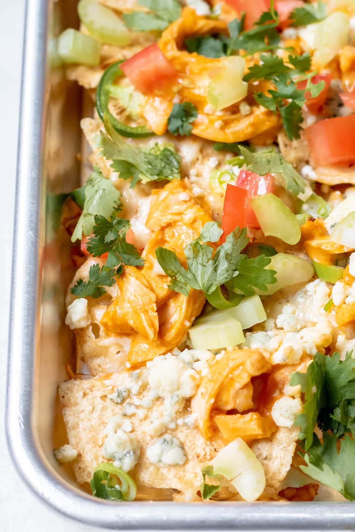 close up of chicken nachos