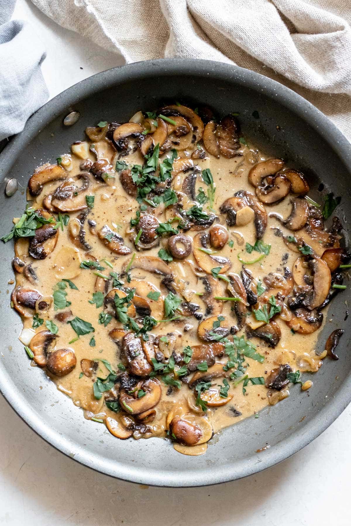 mushroom marsala sauce in a saute pan