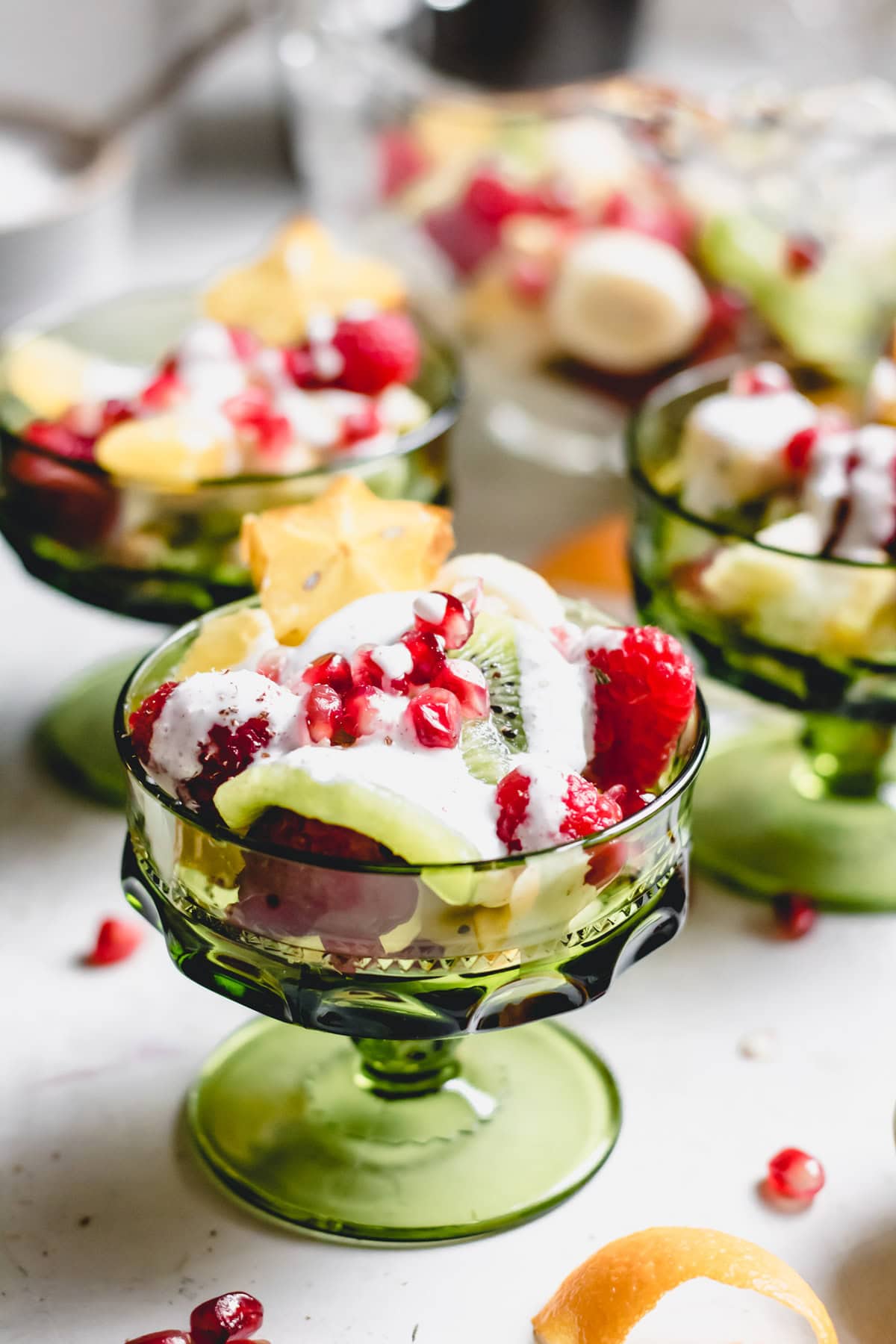 angled view of christmas fruit salad in a serving bowl