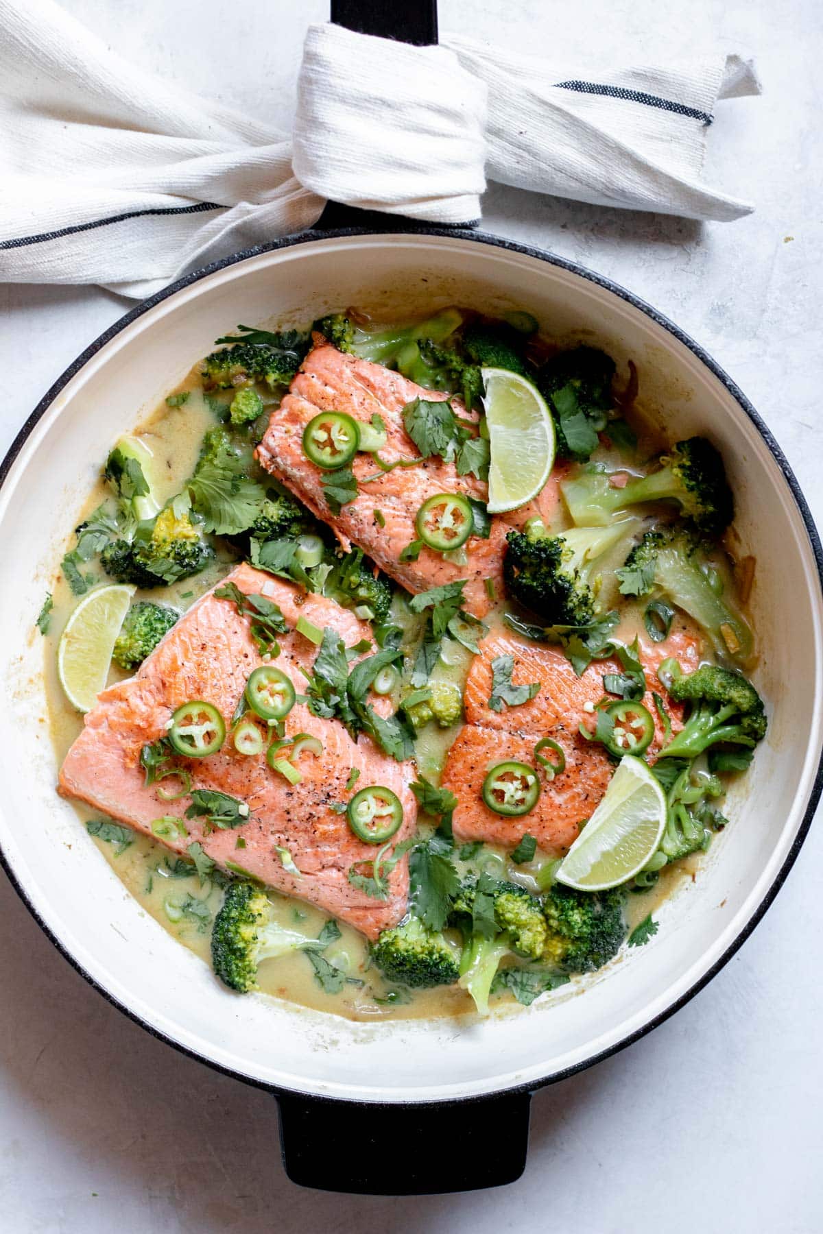 Green Curry in a pan with salmon and broccoli