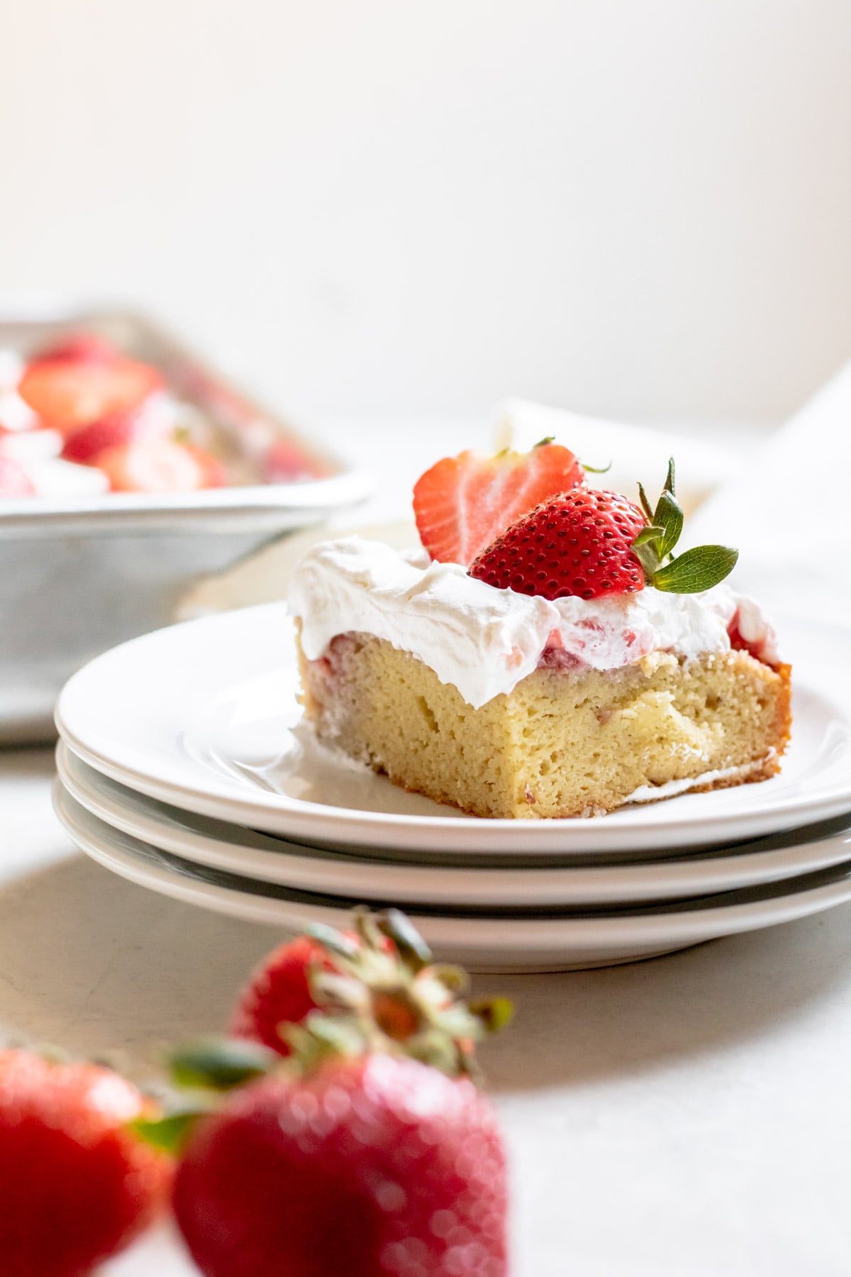 a slice of Strawberry Poke Cake