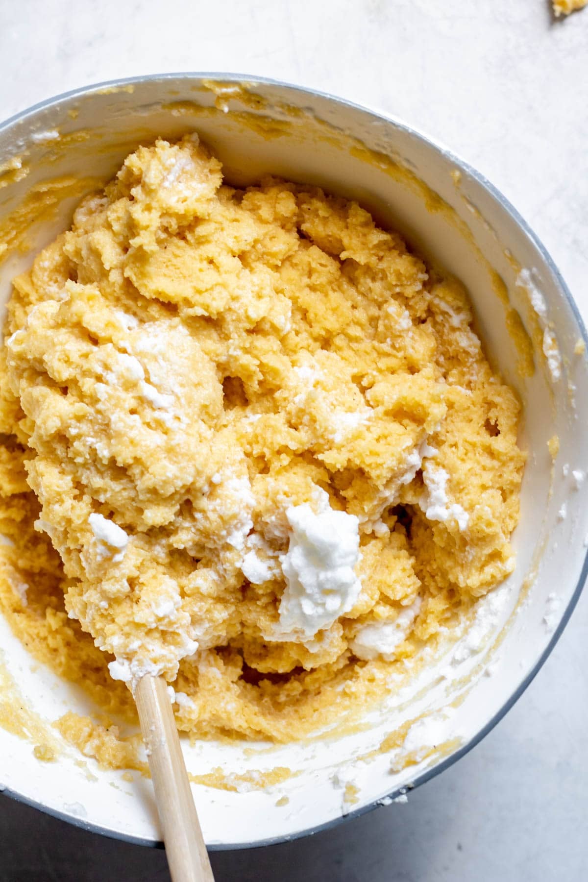 mixing dough and egg whites