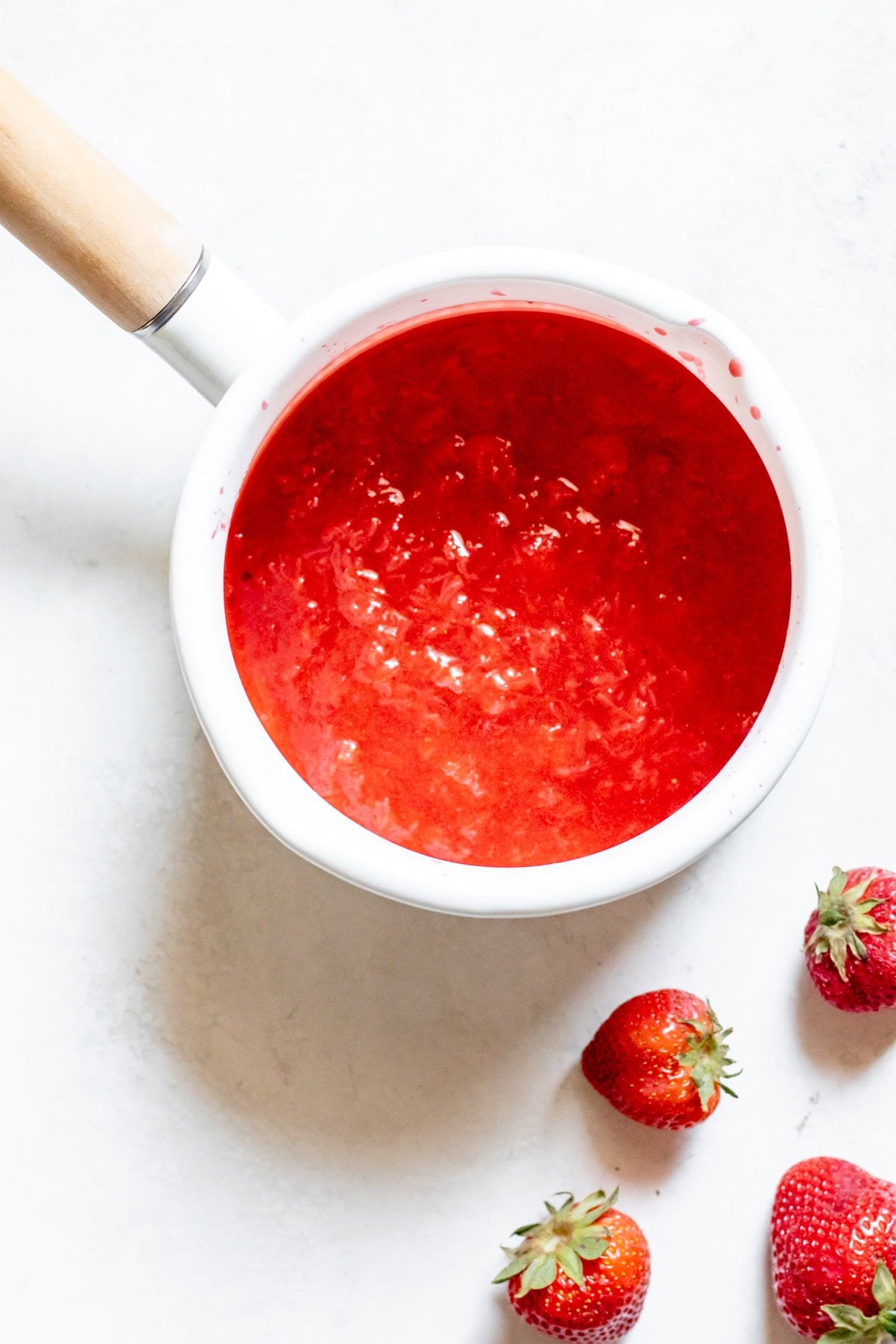 strawberry sauce in a small sauce pan