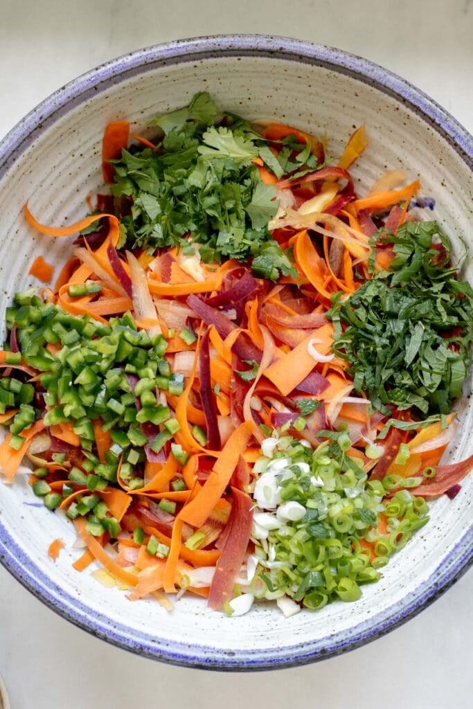 chopped veggies and herbs in a bowl