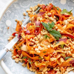peanut lime carrot salad in a bowl