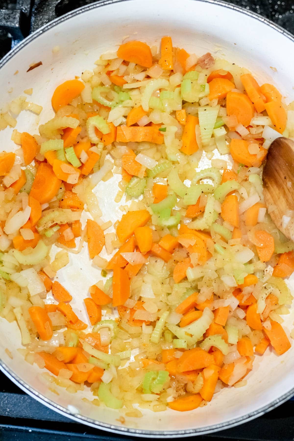 sauteeing veggies in a pot