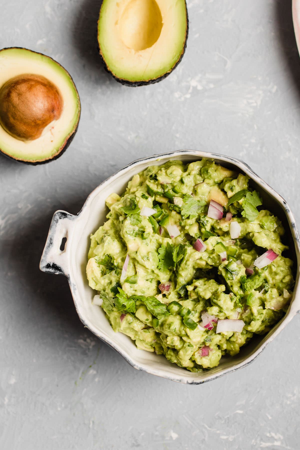top down view of guac in a bowl